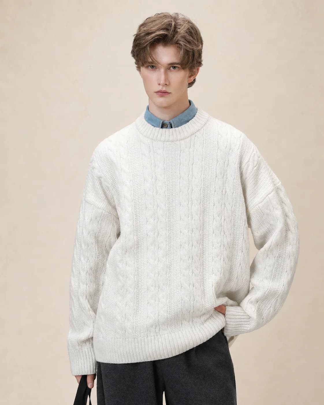Pull homme en maille torsadée