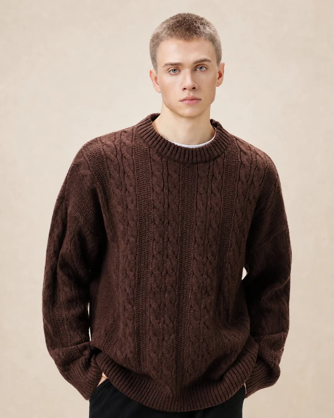 Pull homme en maille torsadée